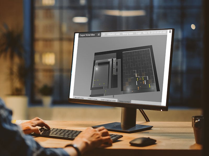 Over the Shoulder Shot of a Young App Developer Using Desktop Computer